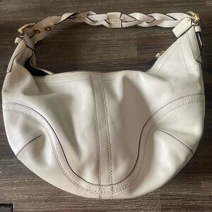 White Coach bag. Used a few times. Good condition